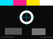 A test chart at 77 by 57 pixels: the colour bars survive but the resolution wedges have collapsed into mush.